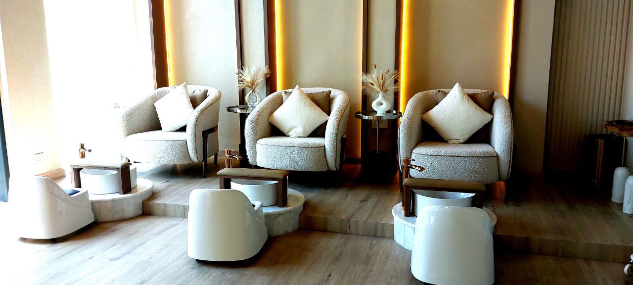 Elegant beauty salon interior at Kay Homes, featuring a well-organized and modern treatment area.