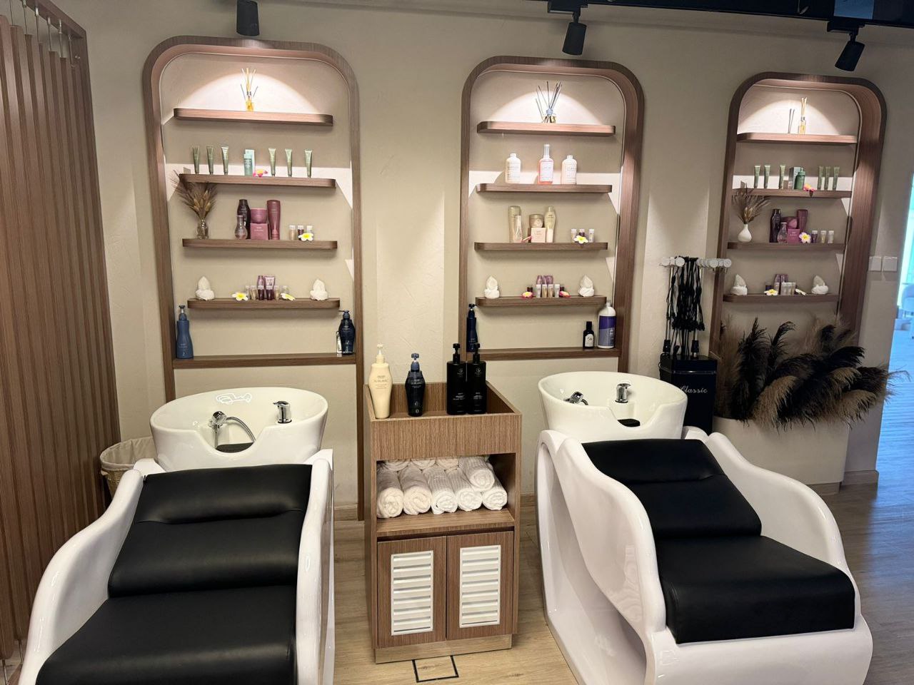 Luxury beauty salon service area at Kay Homes, with modern equipment and a sleek, relaxing environment.