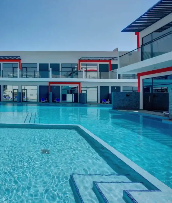 Luxurious bedroom suite at Kay Homes featuring elegant furnishings and modern decor.